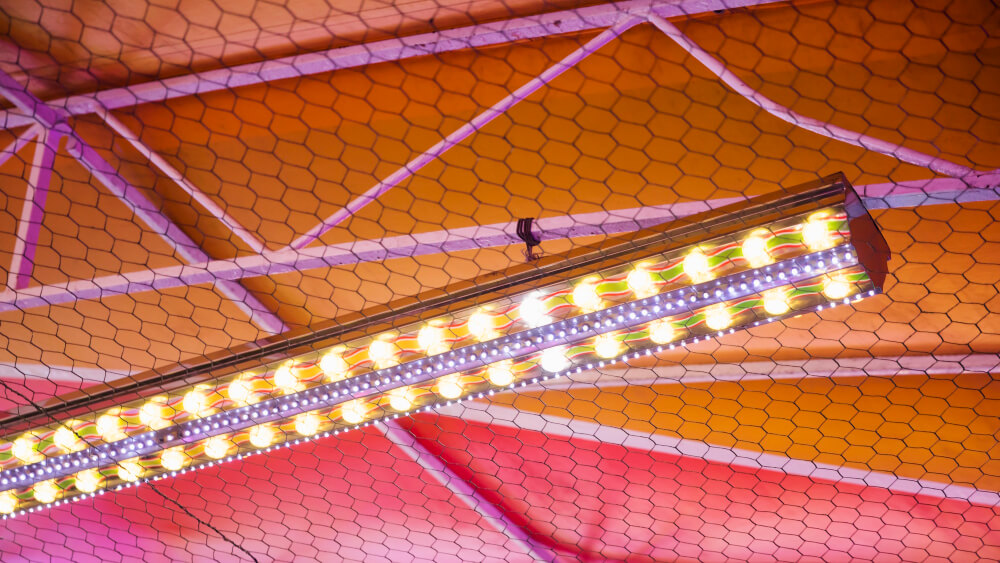 LED battens providing bright warehouse lighting for improved visibility and safety.