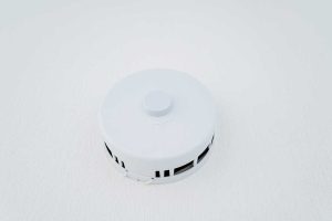 PSA smoke alarm fixed in the ceiling for fire safety and home protection